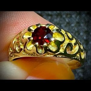 Gold filigree garnet ring